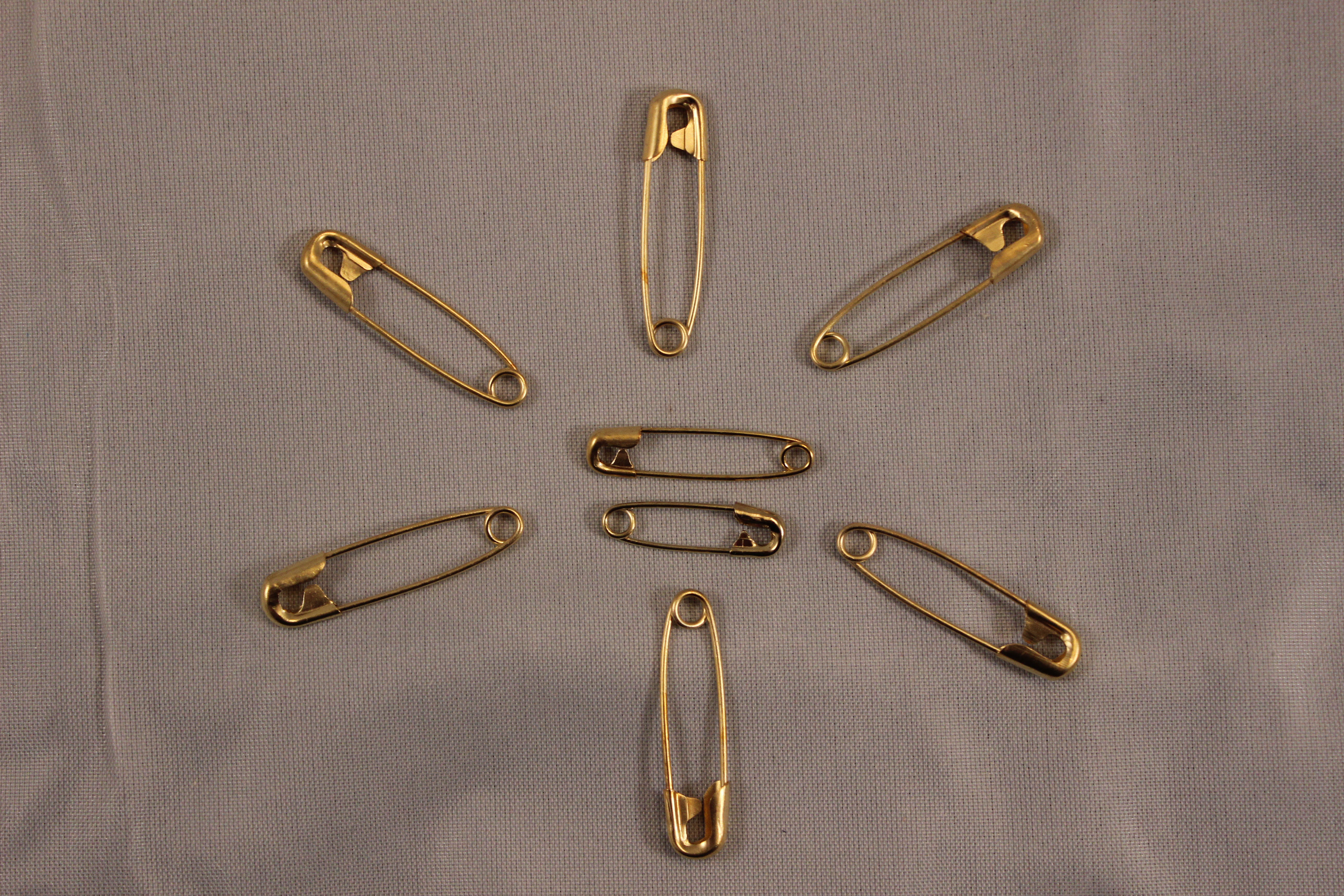Colored safety pins Stock Photo